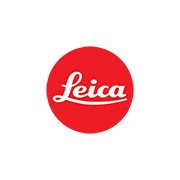 Logo Leica in un cerchio rosso su sfondo bianco.